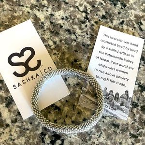 SASHKA CO hand crocheted by artisans in Nepal.  Pretty dark silver beads